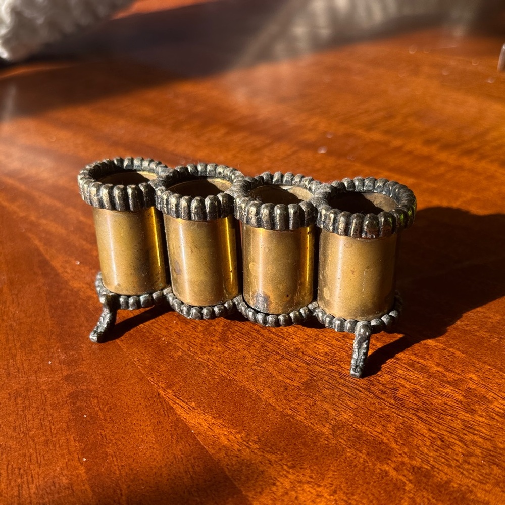 Antique brass lipstick display